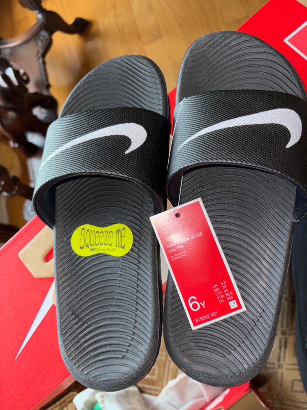 Nike Black Slide Sandals with White Swoosh